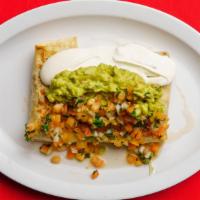 Super Quesadilla · Big flour tortilla with meat, melted cheese topped with guacamole, sour cream and pico de ga...