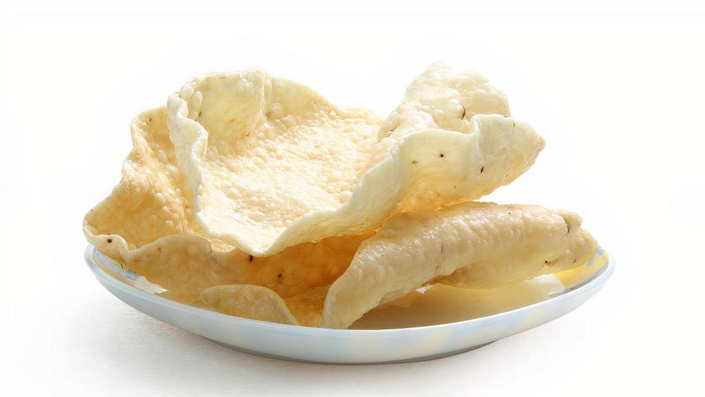 Papad (2pcs) · Crispy wafers made with gram flour.