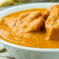 Chicken Tikka Masala · Boneless Chick ed in Creamy Tomato sauce with coriander and House Special Spices.