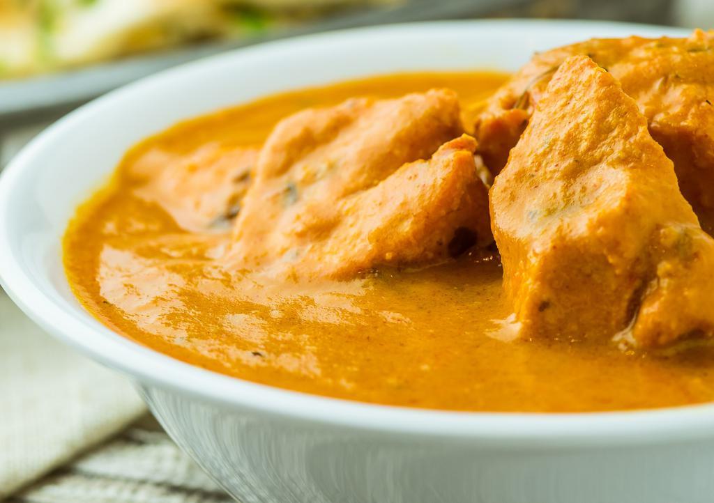 Chicken Tikka Masala · Boneless Chicken cooked in creamy Tomato sauce with coriander and House Special Spices.