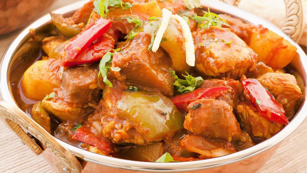 Chicken Vindaloo · Boneless chicken curry cooked with Potato and Vindaloo Masala and Spices.