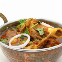 Mutton Masala · Goat Meat Cooked with Onion Sauce and Spices.