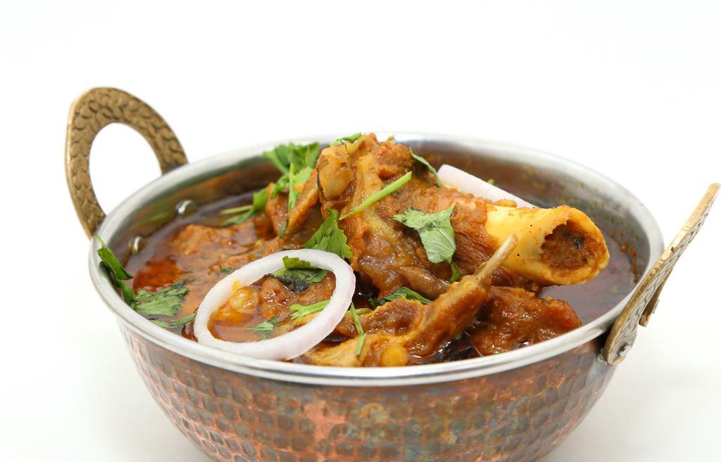 Mutton Masala · Goat Meat Cooked with Onion Sauce and Spices.