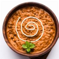 Dal Makhani · Whole Black lentil cooked in gravy sautéed with Tomato, onions and Mild spices with light Bu...