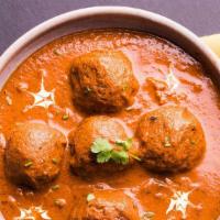 Malai Kofta · Fried Vegetable dumplings cooked with Cashews in tomato and onion creamy sauce.