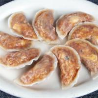 A3. Mool Man Doo · Kimchi and pork or vegetable. Boiled handmade dumpling with your choice of stuffing.