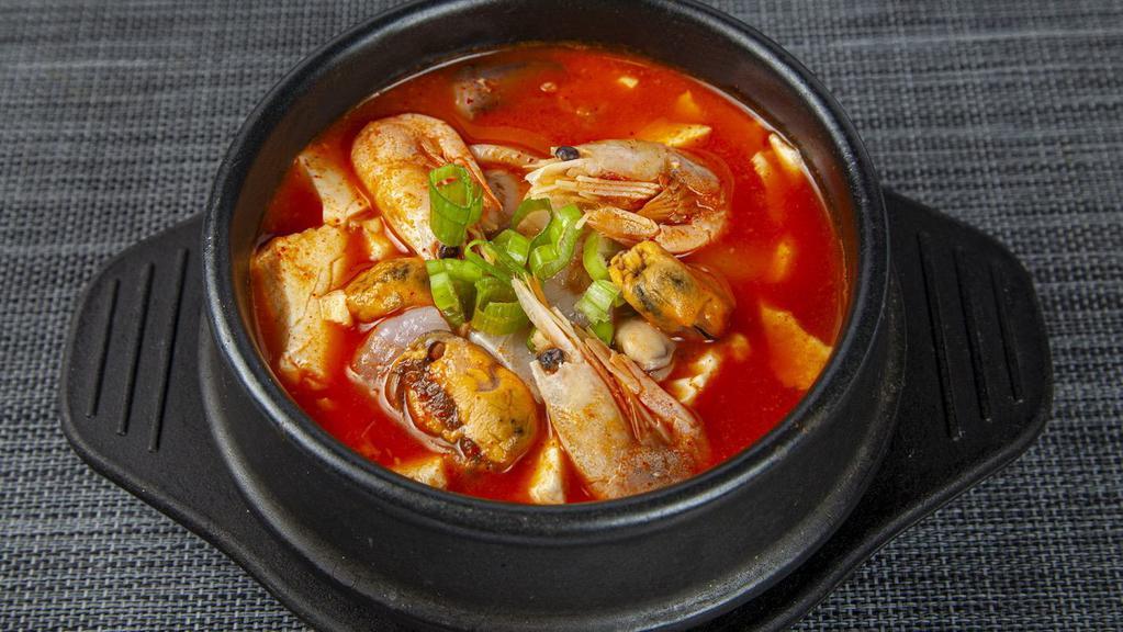 T4. Hae Mool Soon Doo Boo · Seafood soft tofu soup with shrimp, clam, and calamari.