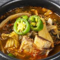 S6. Woo GU Ji Gal Bi Tang · Spicy. Soybean paste beef short rib soup with Napa cabbage.