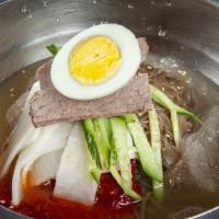 N2. Bi Bim Naeng Myoun · Cold noodle with spicy sauce, sliced beef, cucumber, radish, and egg.