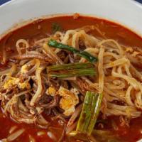 Yook Gae Jang Kal Gook Soo · Medium spicy. Spicy noodle soup with shredded beef, egg, and vegetables.