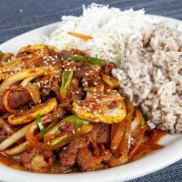 M2. Dae Ji Bul Go Gi Dup Bab · Spicy. Stir-fried marinated spicy pork with vegetables, rice, and salad.