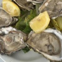 Oysters · Comes with fried potato wedges or french fries coleslaw and tartar sauce.