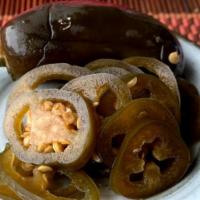 Pickled Jalapeno (12Oz) · Sliced jalapeño pickled in korean way with soy sauce. Dietary preferences: Vegan Nut-free