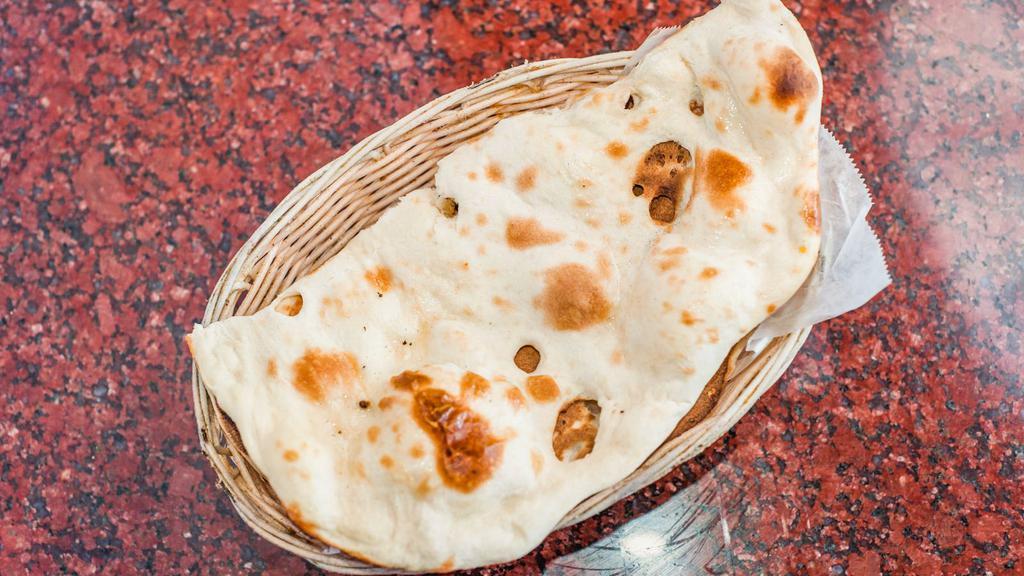 Butter Naan · Bread baked in a clay oven then brushed with butter.