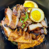 Braised Pork Belly (Kaw) · An authentic and unforgettable, sweet and savory dish. Pork belly braised in a dark thin fla...