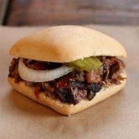 Slider · Choice of a slow-smoked meat on a yeast roll.