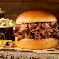 Brisket Classic Sandwich Plate · Includes a choice of chopped or sliced delicious slow-smoked brisket on a brioche bun, serve...