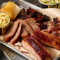 Pork Out Platter · Ribs, pulled pork, pork burnt ends and choice of sliced sausage, 2 sides and a roll.