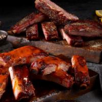 18 Piece Ribs · 18 pieces of Fall off the Bone Ribs with choice of flavor.