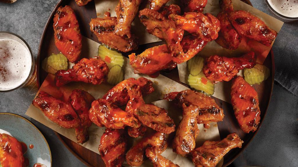 24 Piece Wings · 24 Piece of Pit Smoked Wings with choice of flavor