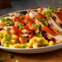Buffalo Chicken Mac Stack · Spicy Buffalo Chicken with creamy mac an cheese topped with green onions
