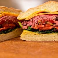 The Classic Roast Beef And Cheddar · With mayo, yellow mustard, mixed greens, tomato, pickles, onions and mild Italian peppers on...