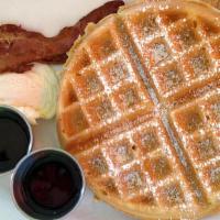Belgian Waffle Special · Served with 2 eggs and choice of two link sausage or bacon.