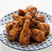 Sweet Chili Wings · Delicious mouthwatering chicken wings tossed and deep-fried with sweet chili sauce.