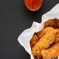 Sweet & Chili Chicken Tenders · Golden Crispy chicken tenders topped with tangy sweet and chili sauce.