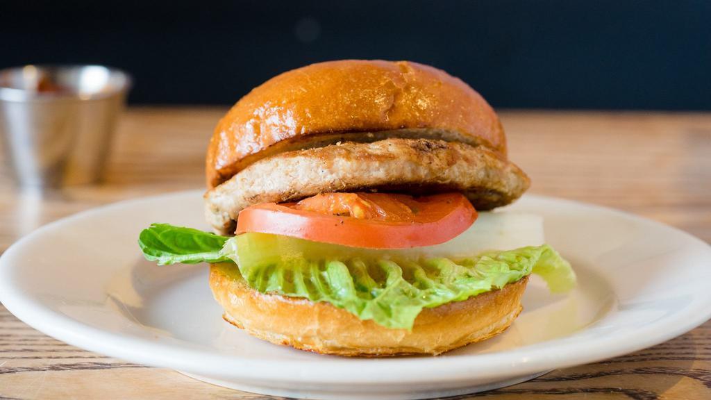 The Antaky Burger · Diestal farms organic turkey burger patty. Served with lettuce, tomatoes, house-made garlic and infused aioli. Cooked medium.
