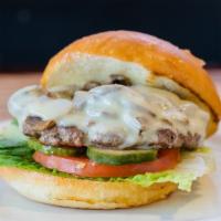 The Drury Burger · Burger with sautéed mushrooms and Swiss. Served with lettuce, tomatoes, house-made garlic an...