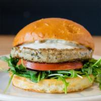 Lamb Burger · Grass fed lamb, organic arugula and tomatoes with a house-made tzatziki sauce. Served with l...
