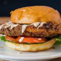 King Solomon Burger · Fried chicken breast. With BBQ ranch sauce. Served with lettuce, tomatoes, house-made garlic...