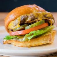 Vegan Cheeseburger · Impossible patty, lettuce, tomatoes, vegan aioli. vegan cheddar cheese.  Vegan bun.