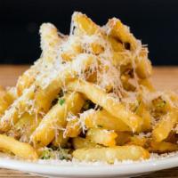 Garlic Fries · House fries with fresh garlic and parsley. Topped with parmesan cheese.