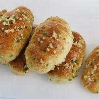 Sack O Garlic Rolls (6) · 6 garlic rolls fit for the garlic roll hall of fame, served with our homemade marinara dippi...