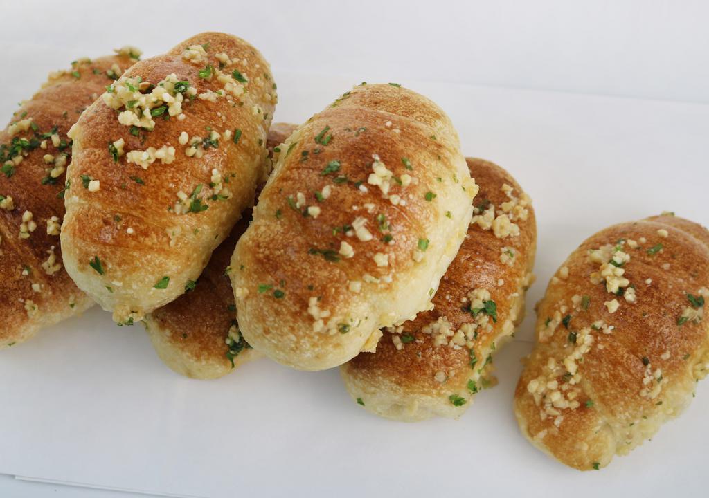 Sack O Garlic Rolls (6) · 6 garlic rolls fit for the garlic roll hall of fame, served with our homemade marinara dipping sauce