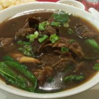 #96. Braised Beef Noodle Soup 牛腩汤面 · ** Additions of items will increase $ 1.00/item