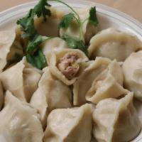 122.  Dumpling饺子 · 12 pieces per order，Chives Fish or Pork Cabbage