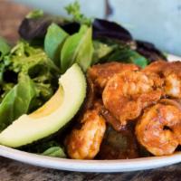 Mofongo Relleno de Camarones · Prawns sauteed with garlic and onion in a tomatoey sauce served over mashed green plantain w...
