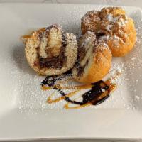 Festival · This dessert is a festival for your mouth.  Three deep fried corn meal and flour batter fest...