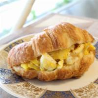 Breakfast Sandwich · Fresh baked croissant filled with scrambled eggs & cheese.