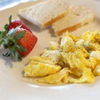 Scrambled Eggs · 2 eggs served with housemade Challah toast and fruit.