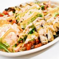 Steak Burrito Bowl · Layered burrito bowl with a choice of toppings, including rice, black beans, cheese, sour cr...