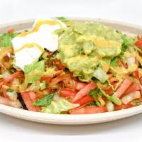 Veggie Burrito Bowl · Layered burrito bowl with a choice of toppings, including rice, black beans, cheese, sour cr...