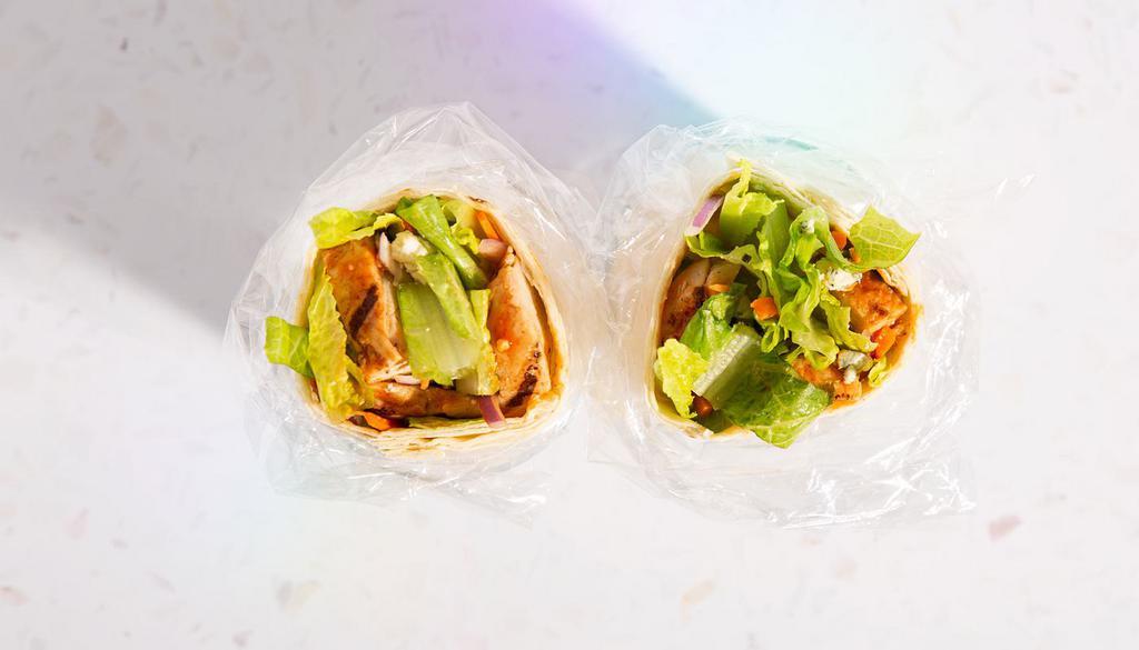 Buffalo Chicken Wrap · Buffalo Chicken, Romaine Lettuce, Shredded Carrot, Red Onions, Blue Cheese Dressing, Flour Wrap