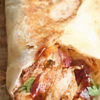BBQ Chicken Wrap · Grilled Chicken, Mixed Greens, Black Beans, Corn, Red Onions, Shredded Cheese, BBQ Sauce, Fl...