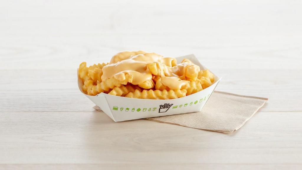 Cheese Fries · Topped with our cheese sauce (contains soy and milk)