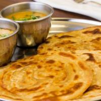 Paratha Plate (After 11:30AM) · Available after 11:30AM
Served with 4 parathas, 8Oz Dal and 8Oz Mix Veg Kurma