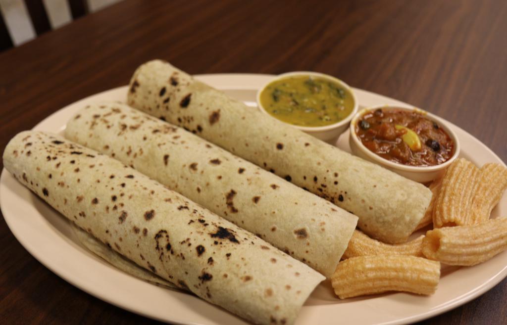 Chapathi Plate (After 11:30AM) · Available after 11:30AM
Served with 4 Chapathi, Dal and today's special curry